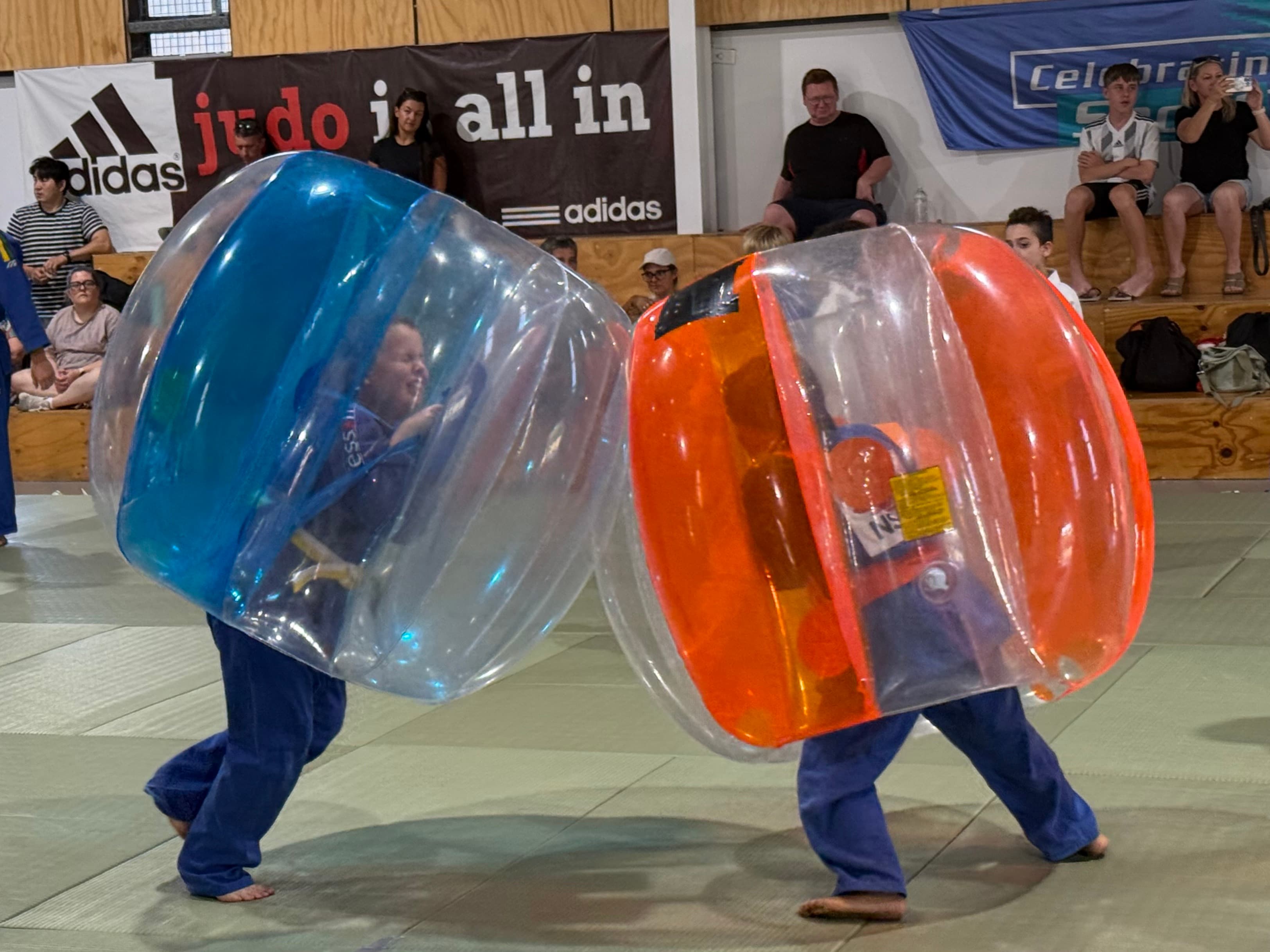 Kids in bubble suits at IIJC Christmas party